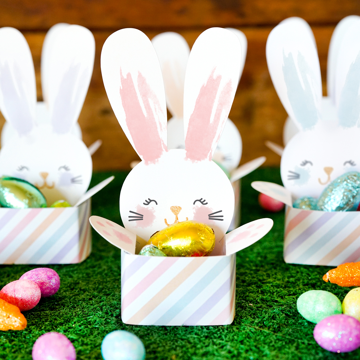 We also have a. printable Easter egg hunt treat box. in the shape of a swee...