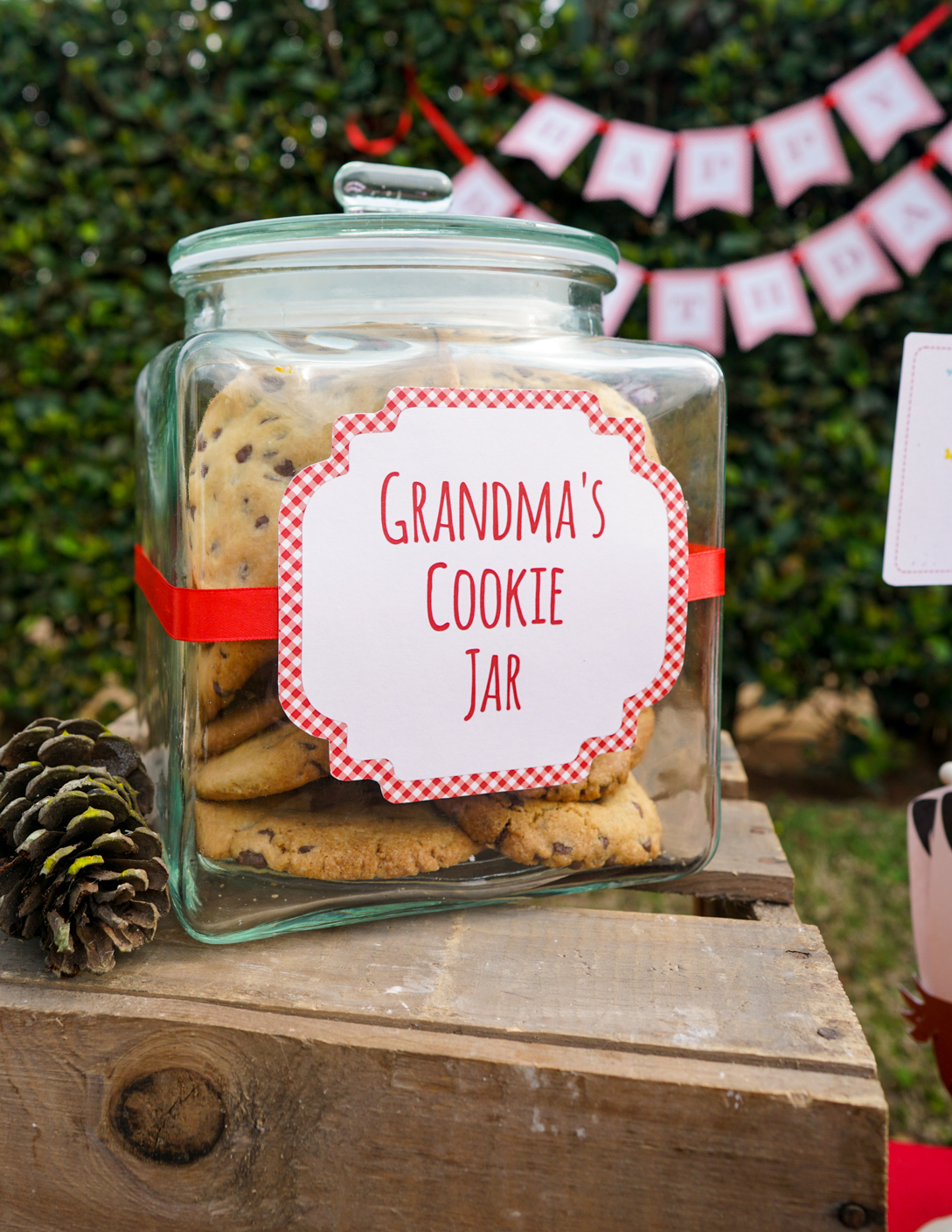 Red Riding Hood Party Food Label on our big glass cookie jar that is filled with giant chocolate chip cookies