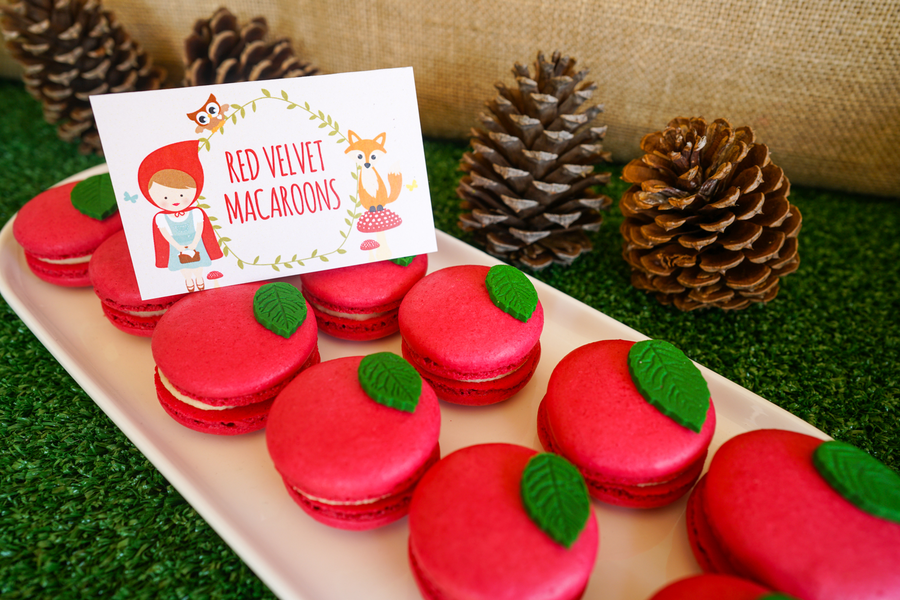 Little Red Riding Hood Party Food Labels with red velvet macarons finished off with a green leaf to look like apples