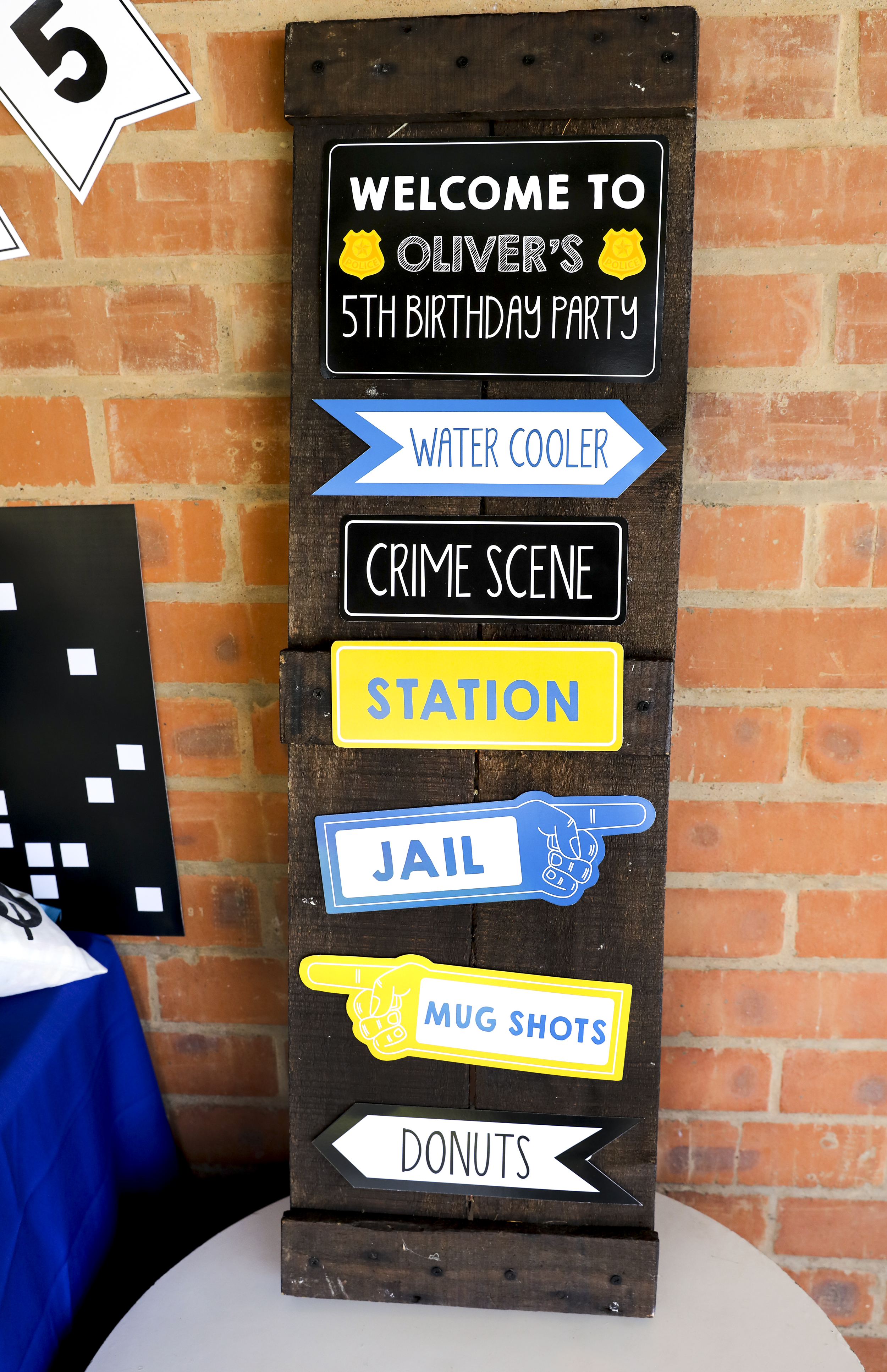 policeman party directional signs